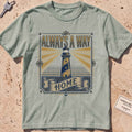Bay heavyweight tee with a vintage engraved lighthouse badge and "Always a Way Home" text.
