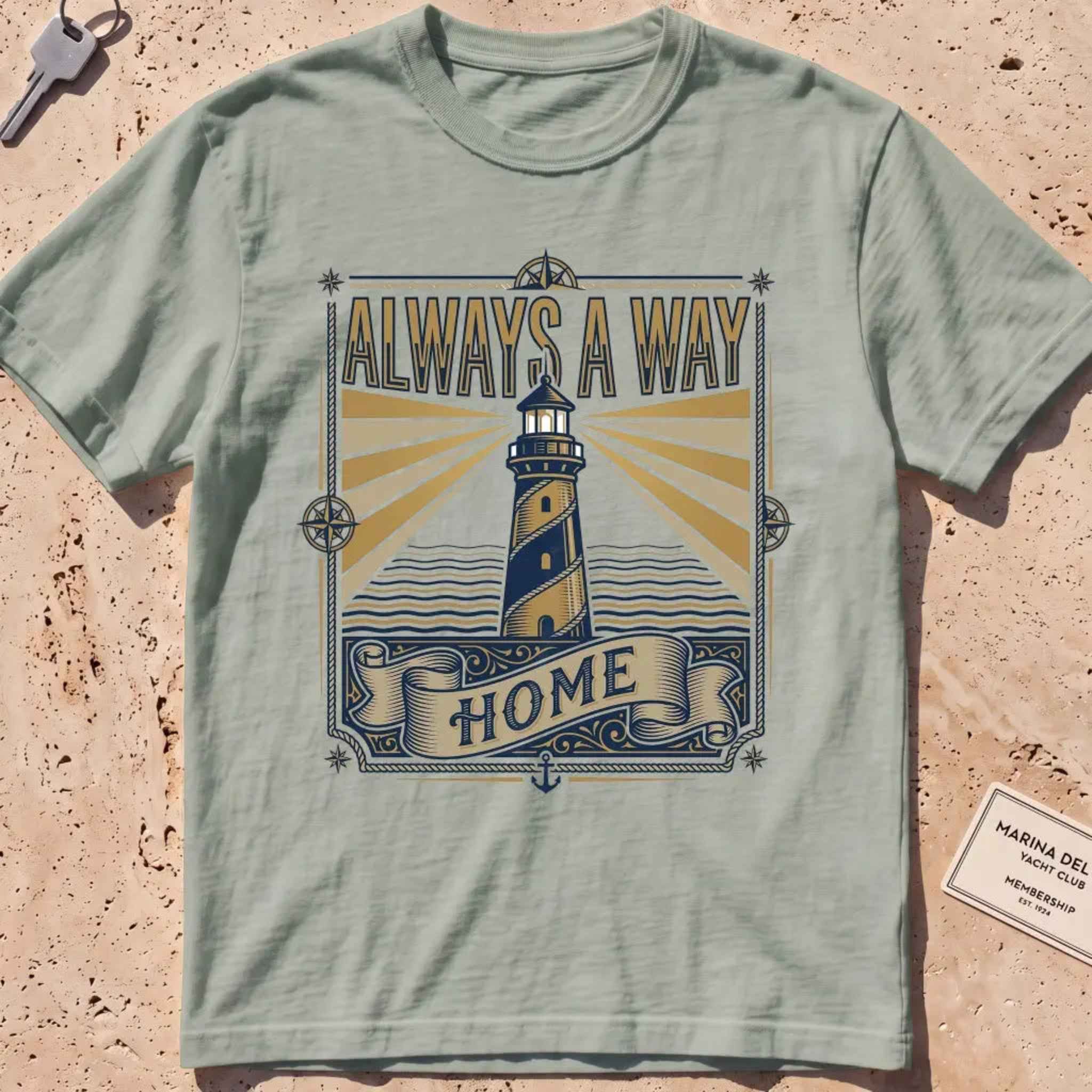 Bay heavyweight tee with a vintage engraved lighthouse badge and "Always a Way Home" text.