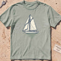Bay heavyweight tee with a two-tone yacht at anchor and a small script wordmark.