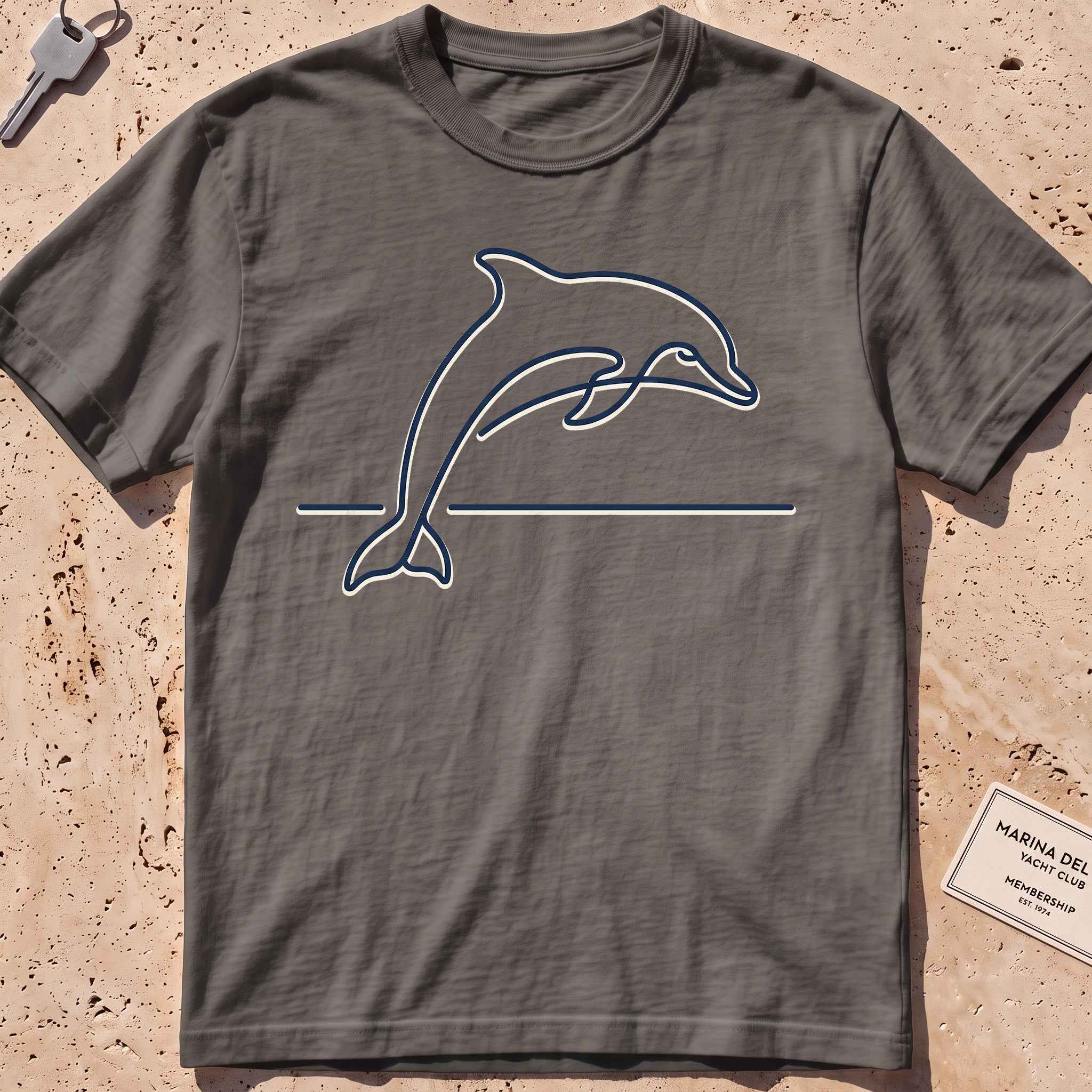 Pepper heavyweight tee with a single-line arcing dolphin graphic.