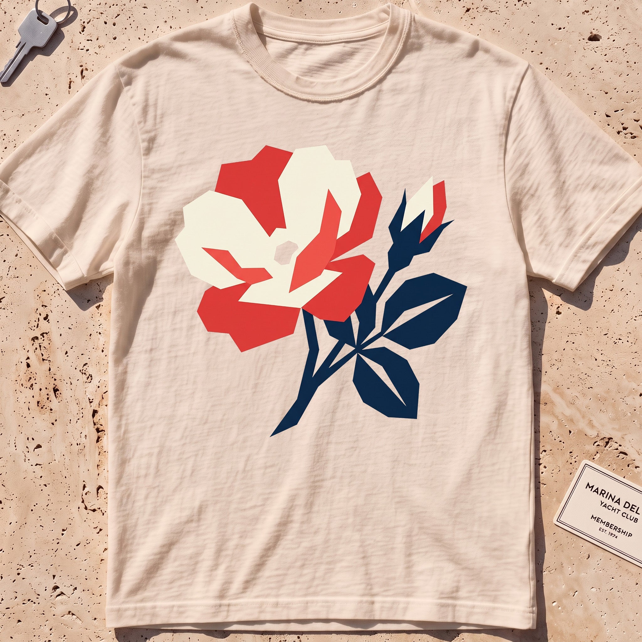 ivory heavyweight tee with a flat-geometric beach rose graphic.