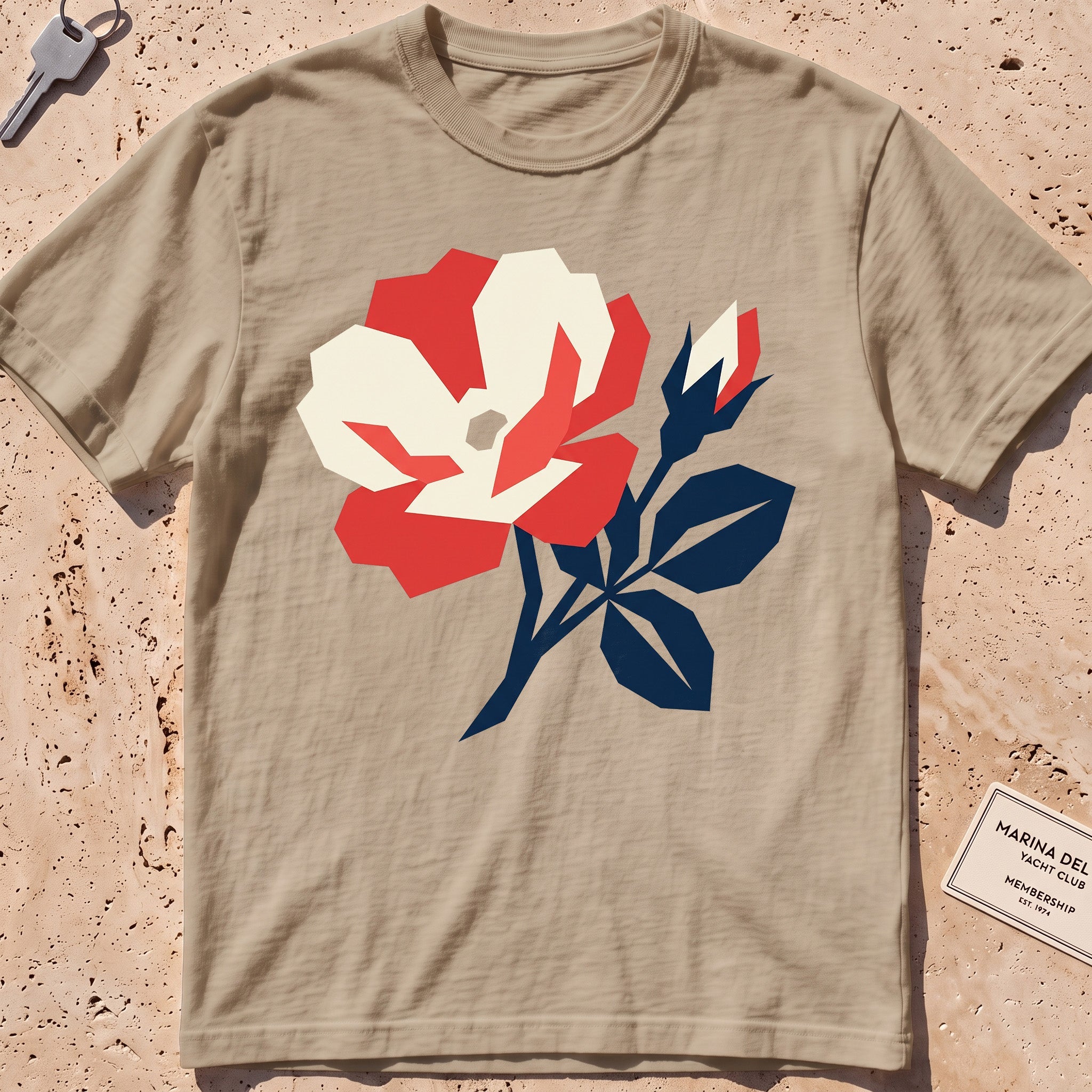 khaki heavyweight tee with a flat-geometric beach rose graphic.