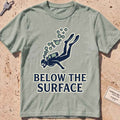 Bay heavyweight tee with a minimalist scuba diver and rising bubbles graphic.