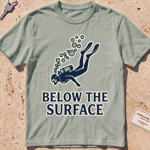 Bay heavyweight tee with a minimalist scuba diver and rising bubbles graphic.