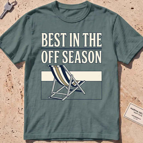 Blue spruce heavyweight tee with "Best in the Off Season" text and an empty deckchair graphic.