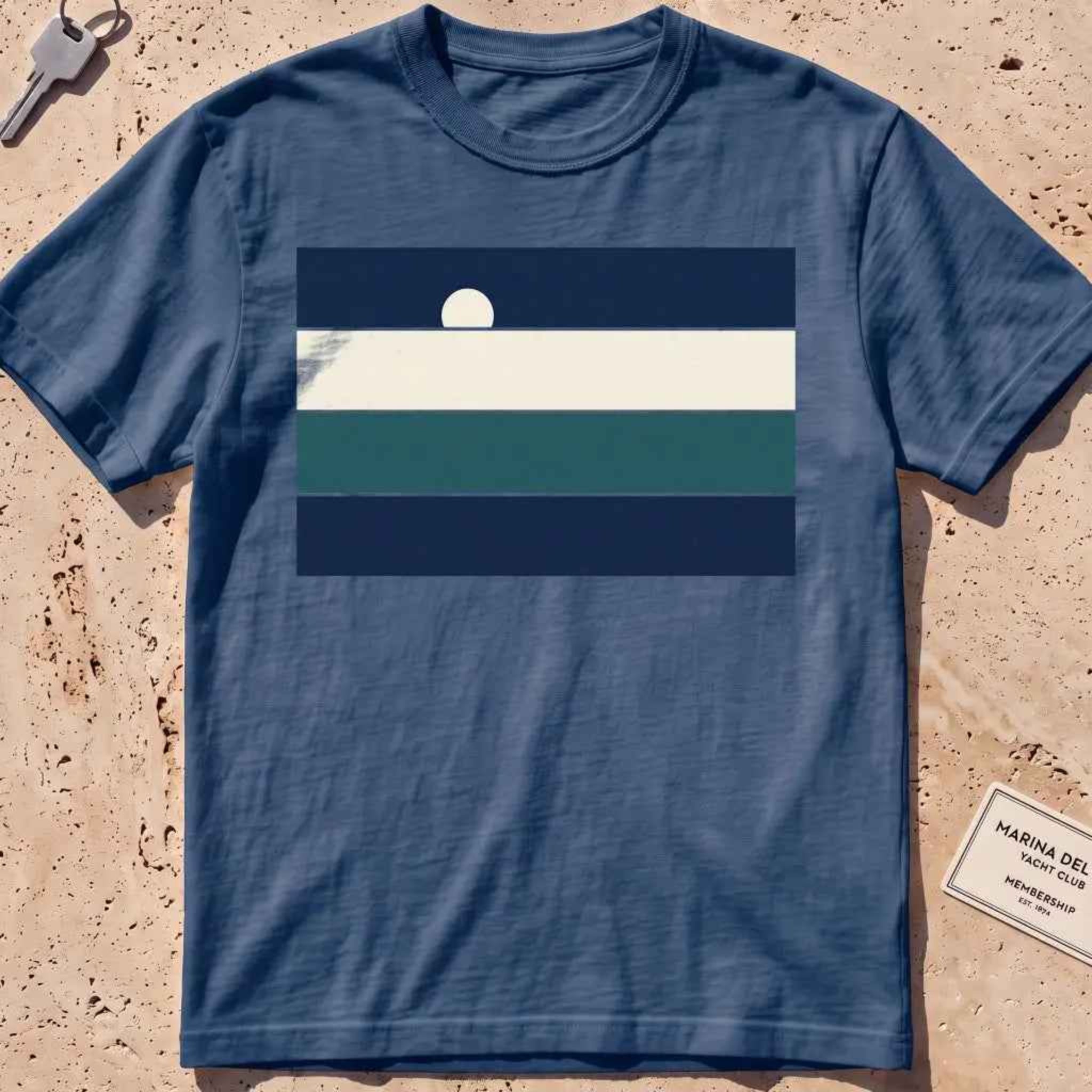 Midnight heavyweight tee with stacked sea-and-sky colour bands and a rising moon.