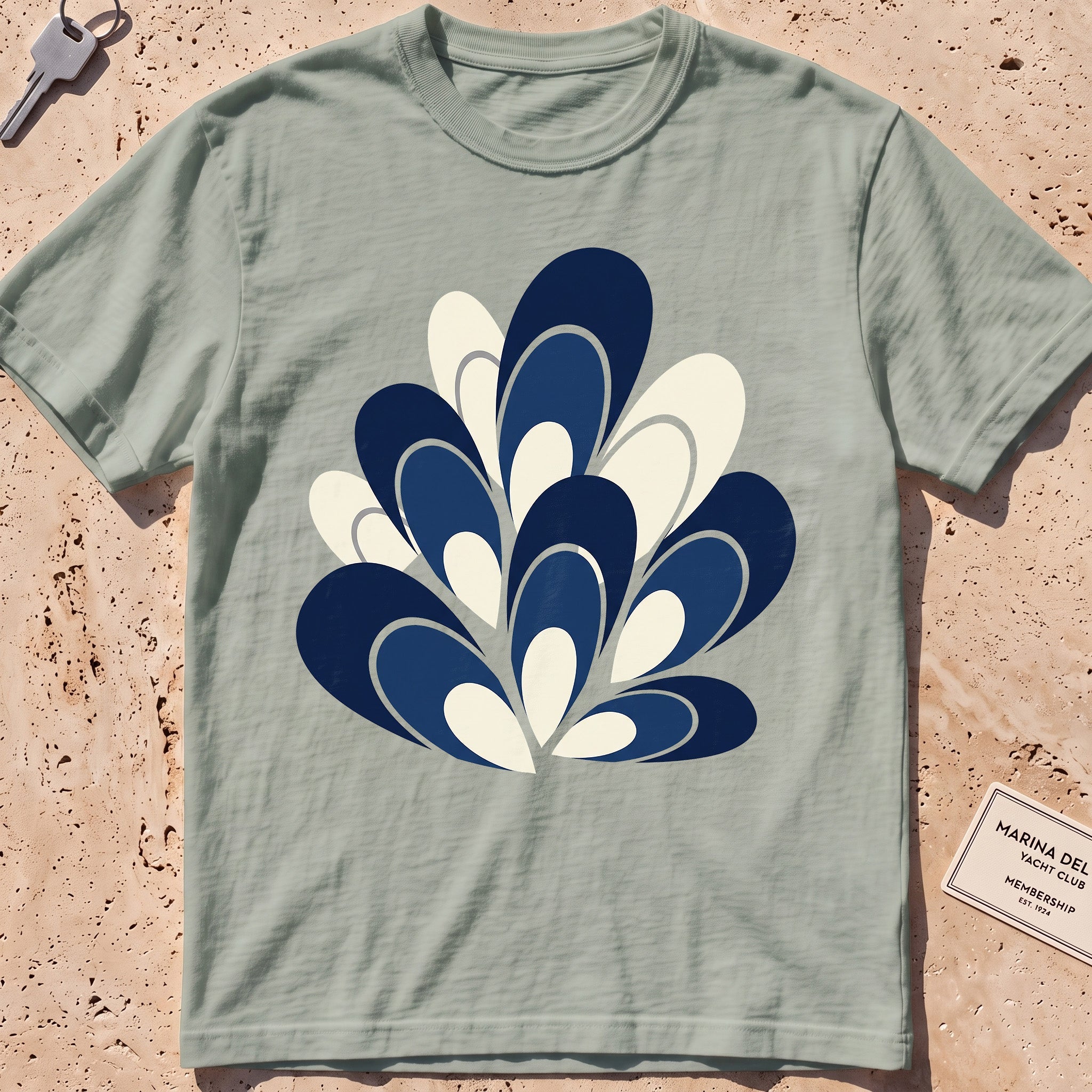 bay heavyweight tee with a flat-geometric blue mussel cluster graphic.