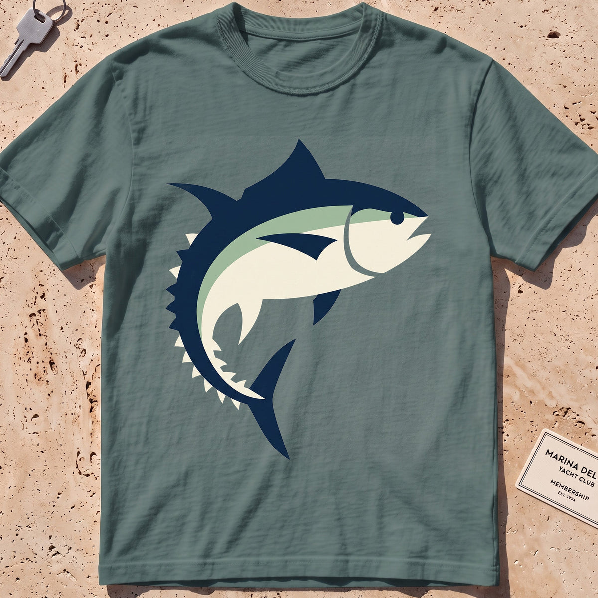 blue spruce heavyweight tee with a flat-geometric bluefin tuna graphic.