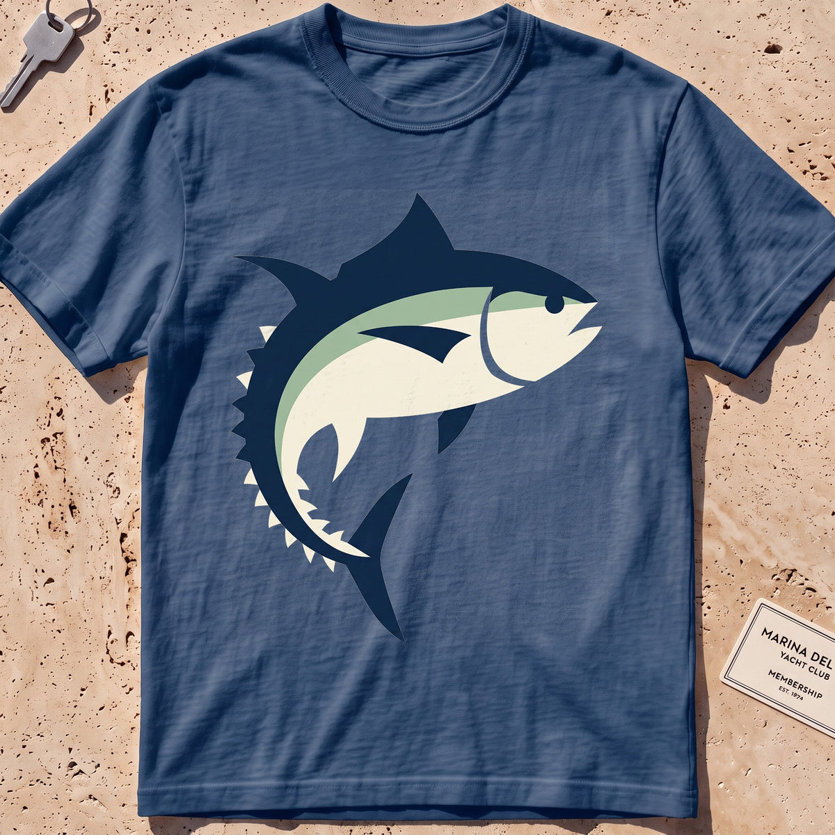 midnight heavyweight tee with a flat-geometric bluefin tuna graphic.