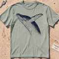 bay heavyweight tee with an etched breaching whale leaping from the water.