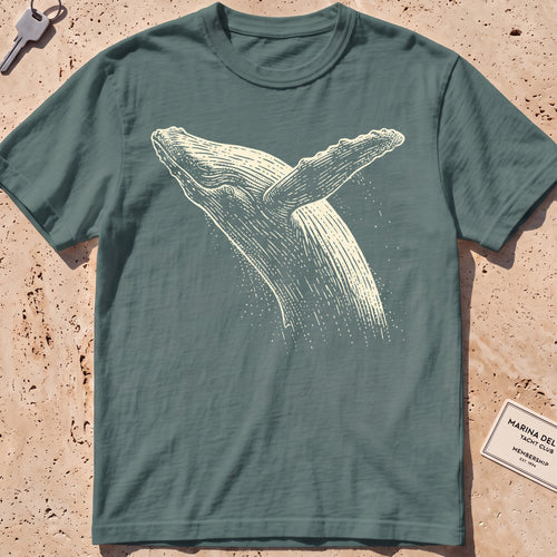 blue spruce heavyweight tee with an etched breaching whale leaping from the water.