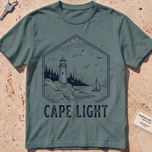 Blue spruce heavyweight tee with an etched vintage lighthouse badge graphic.