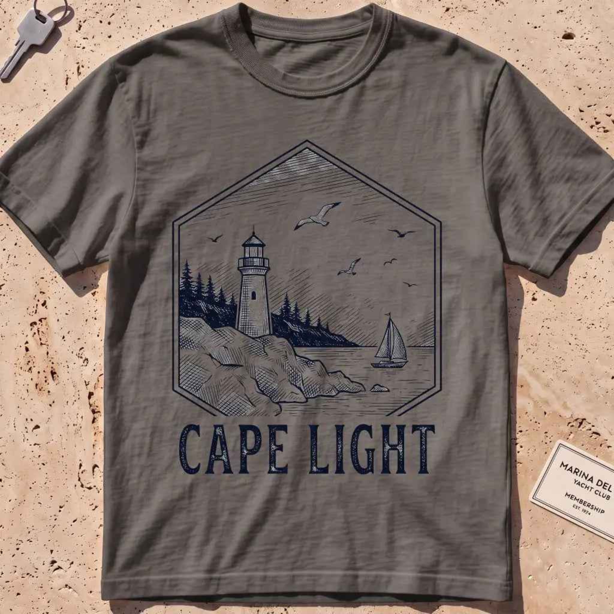 Pepper heavyweight tee with an etched vintage lighthouse badge graphic.