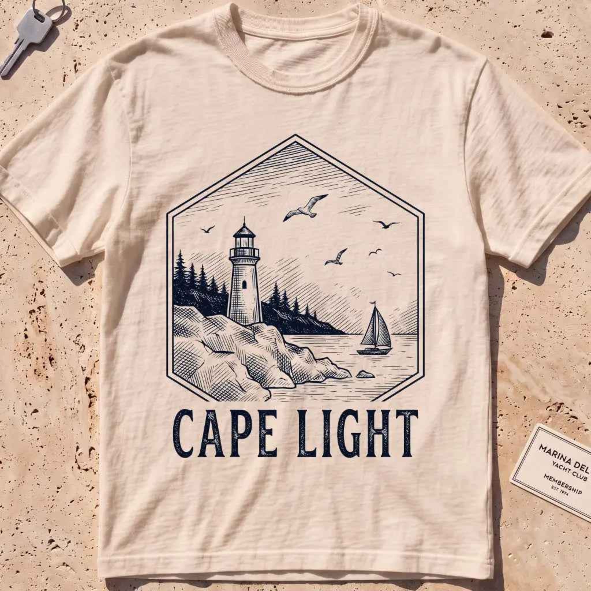 Ivory heavyweight tee with an etched vintage lighthouse badge graphic.