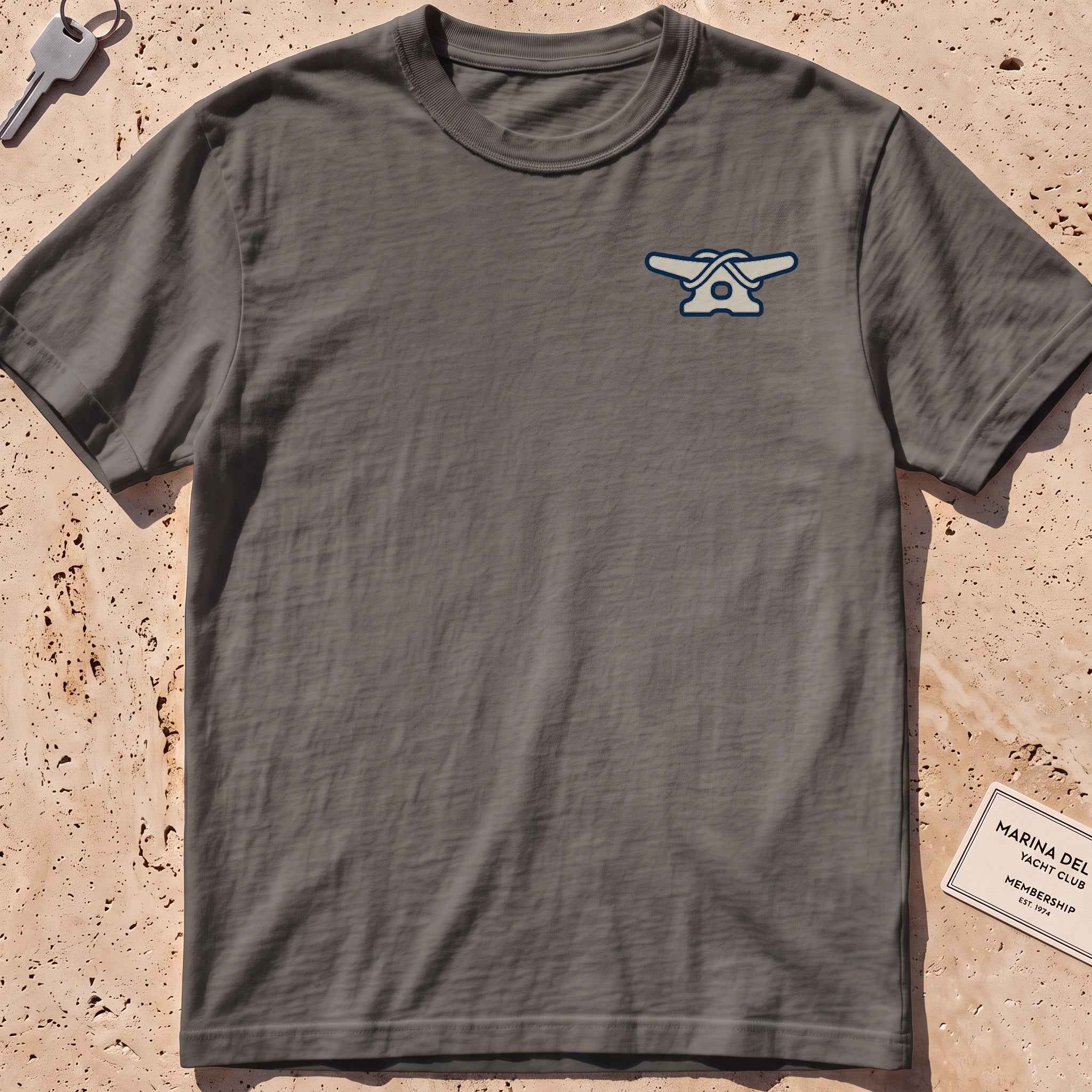 Pepper heavyweight tee with a clean dock-cleat crest graphic.