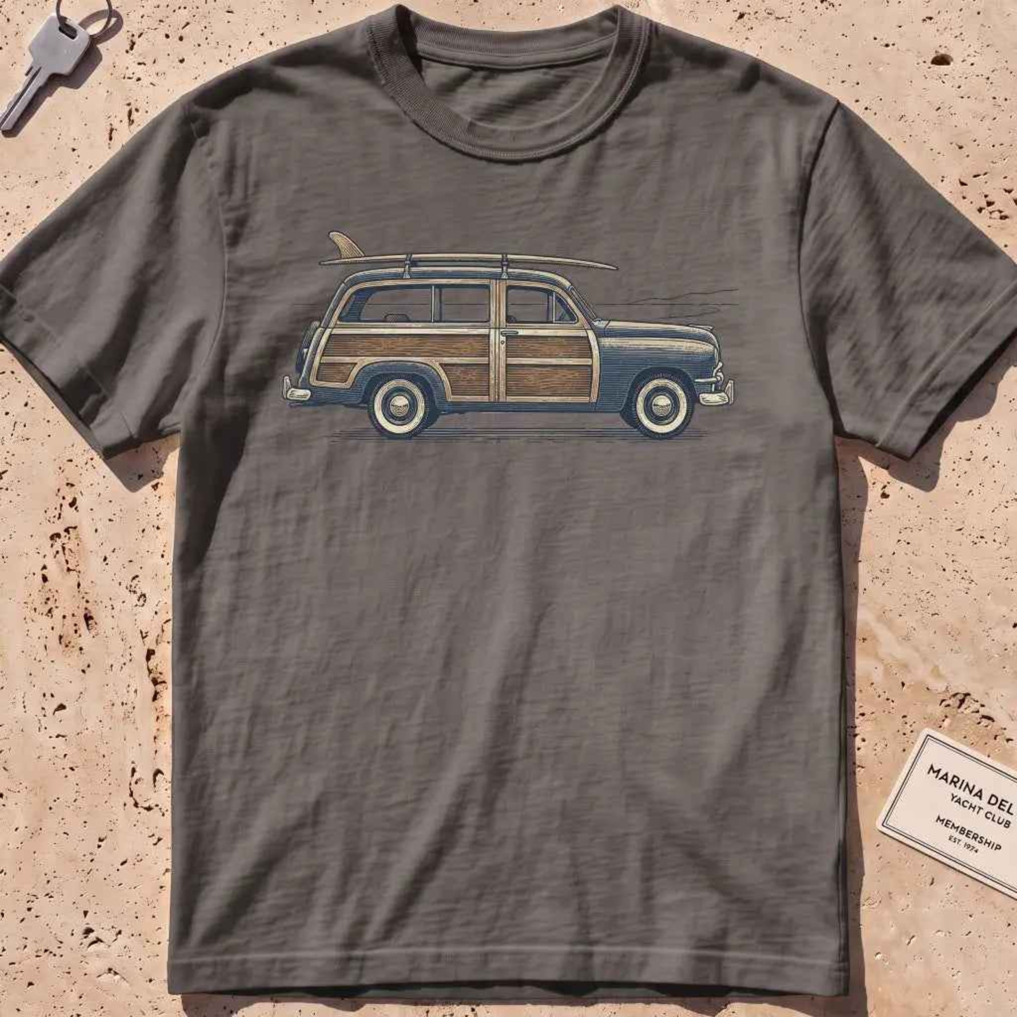 Pepper heavyweight tee with an engraved woodie wagon and surfboard graphic.