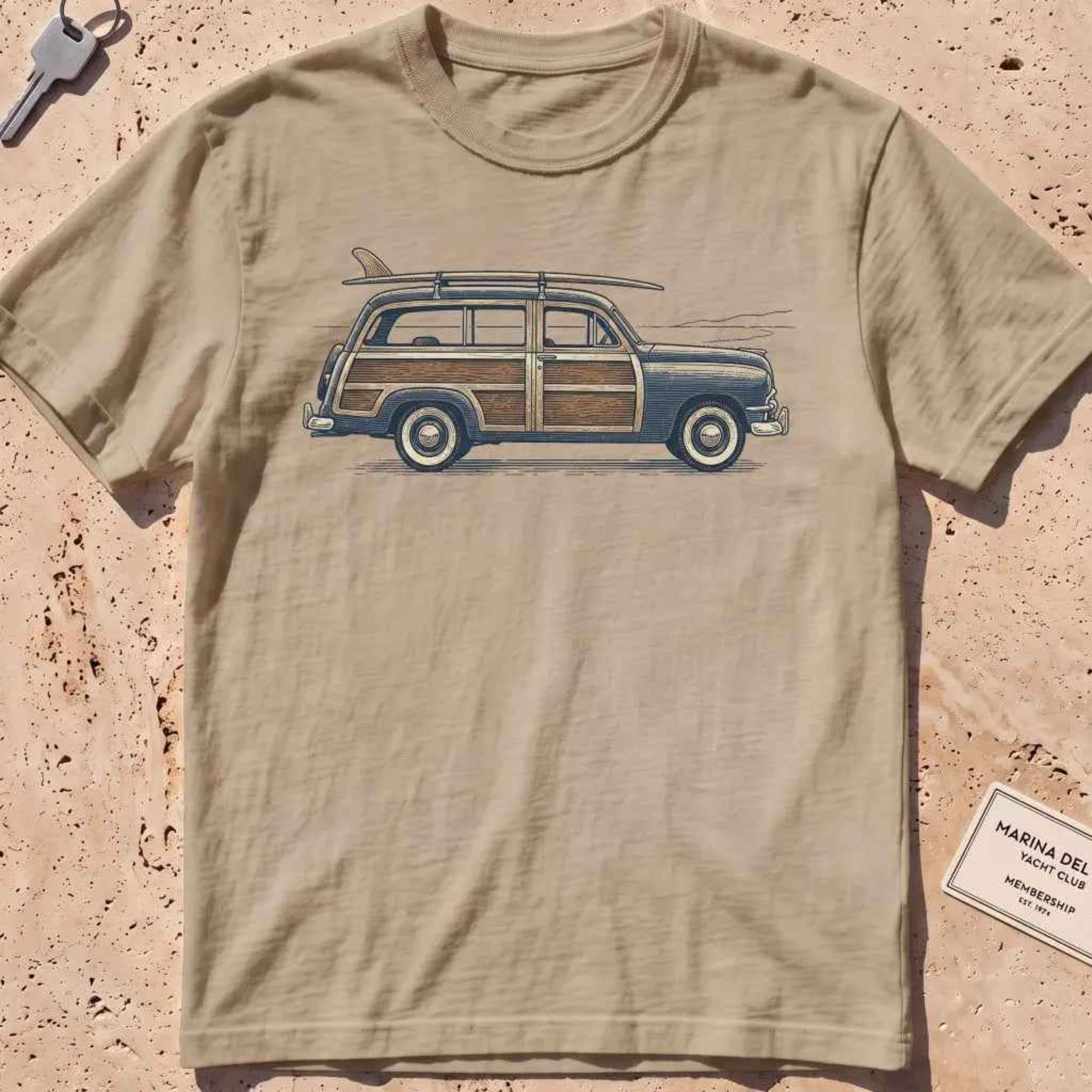 Khaki heavyweight tee with an engraved woodie wagon and surfboard graphic.