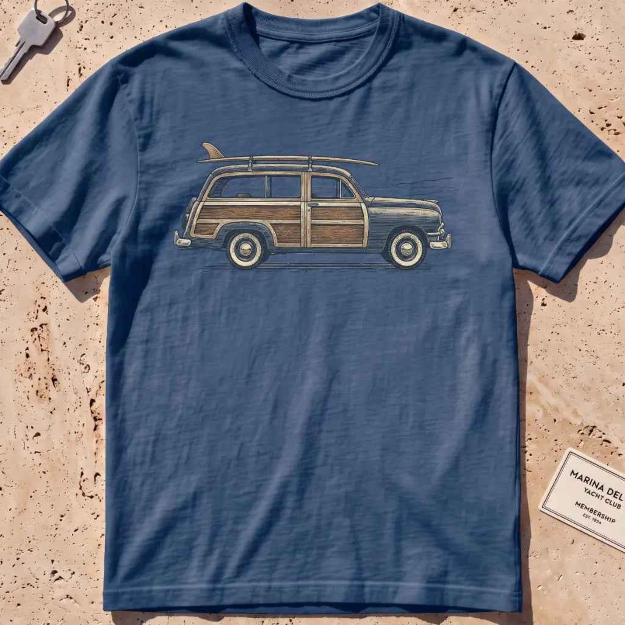 Midnight heavyweight tee with an engraved woodie wagon and surfboard graphic.