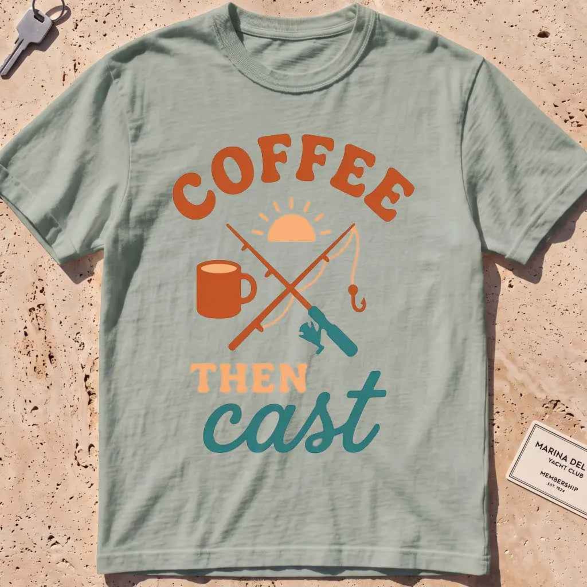 Bay heavyweight tee with a coffee mug, crossed rods and "Coffee Then Cast" text.