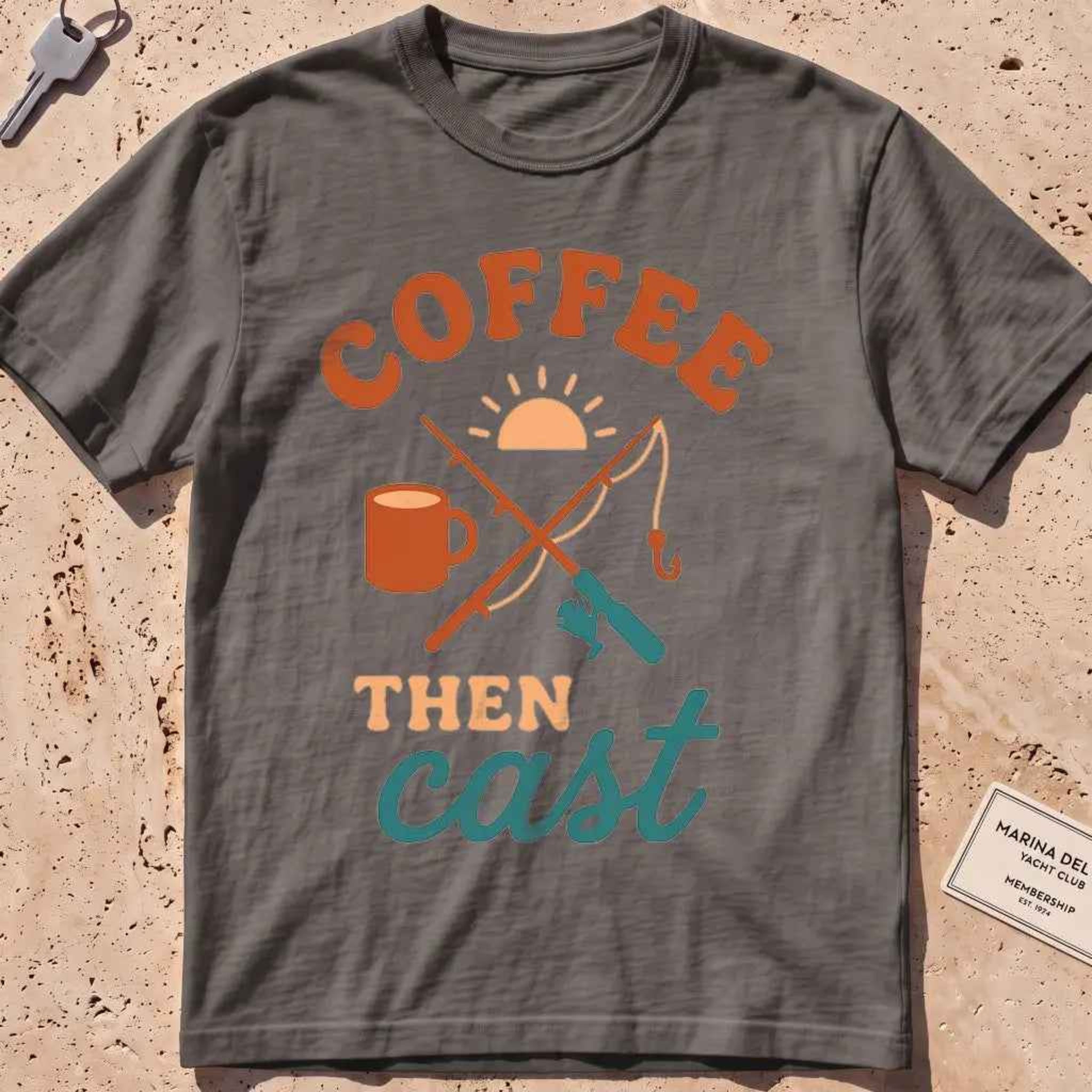 pepper heavyweight tee with a coffee mug, crossed rods and "Coffee Then Cast" text.