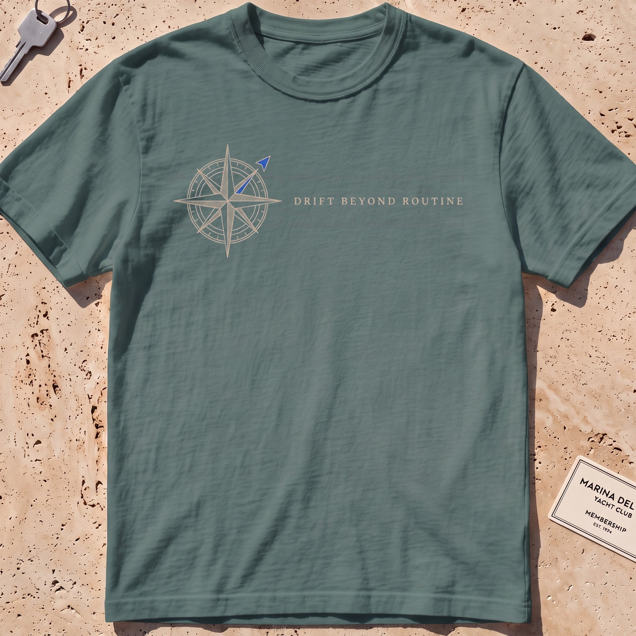 blue spruce heavyweight tee with a compass rose and coordinate band graphic.