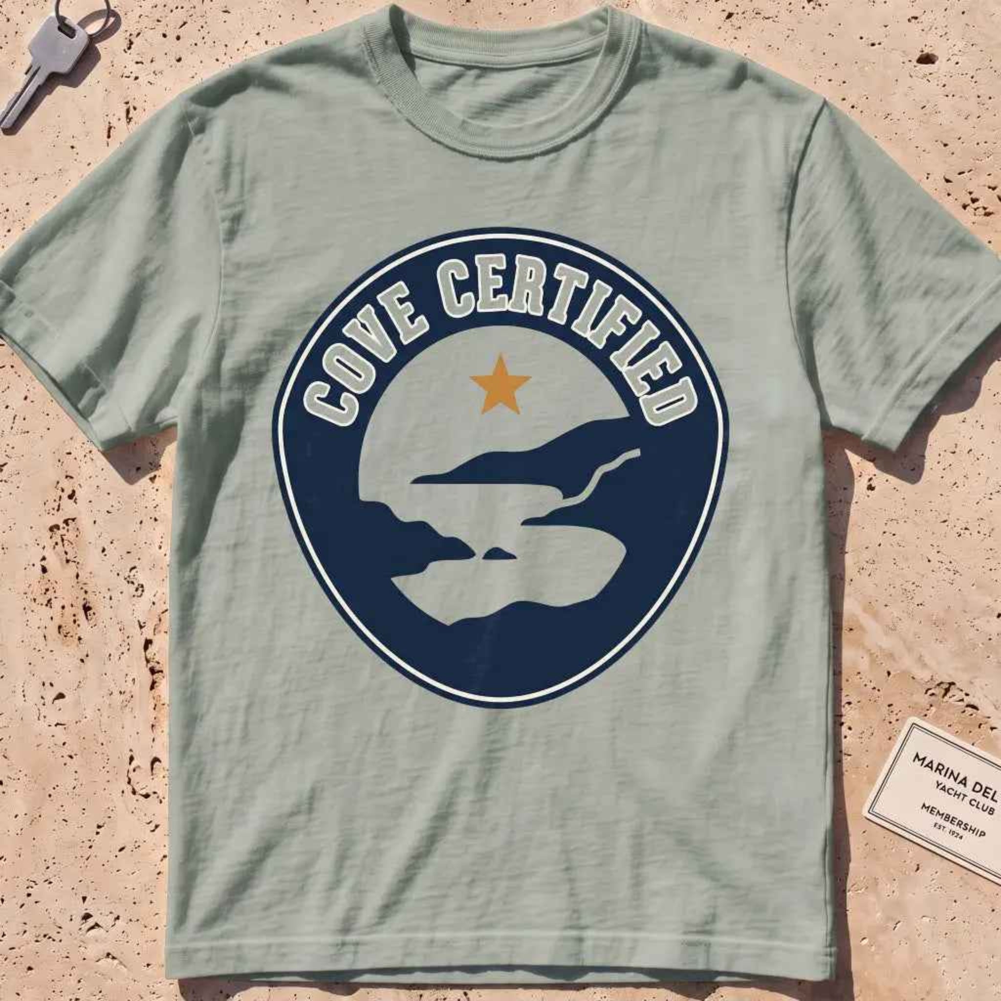 bay heavyweight tee with a mock "Cove Certified" certification badge graphic.