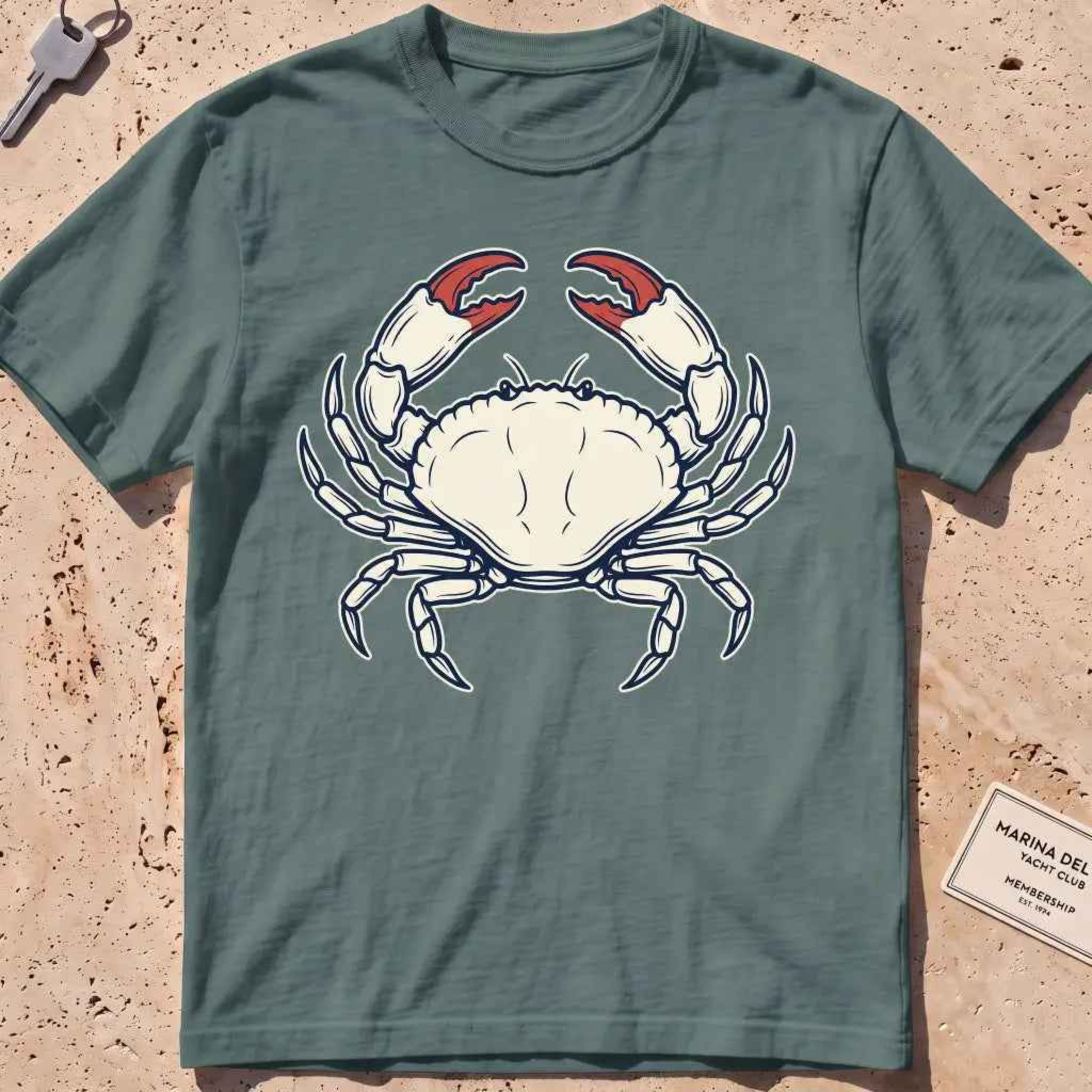 blue spruce heavyweight tee with a finely engraved crab in vintage coastal-wildlife line style.
