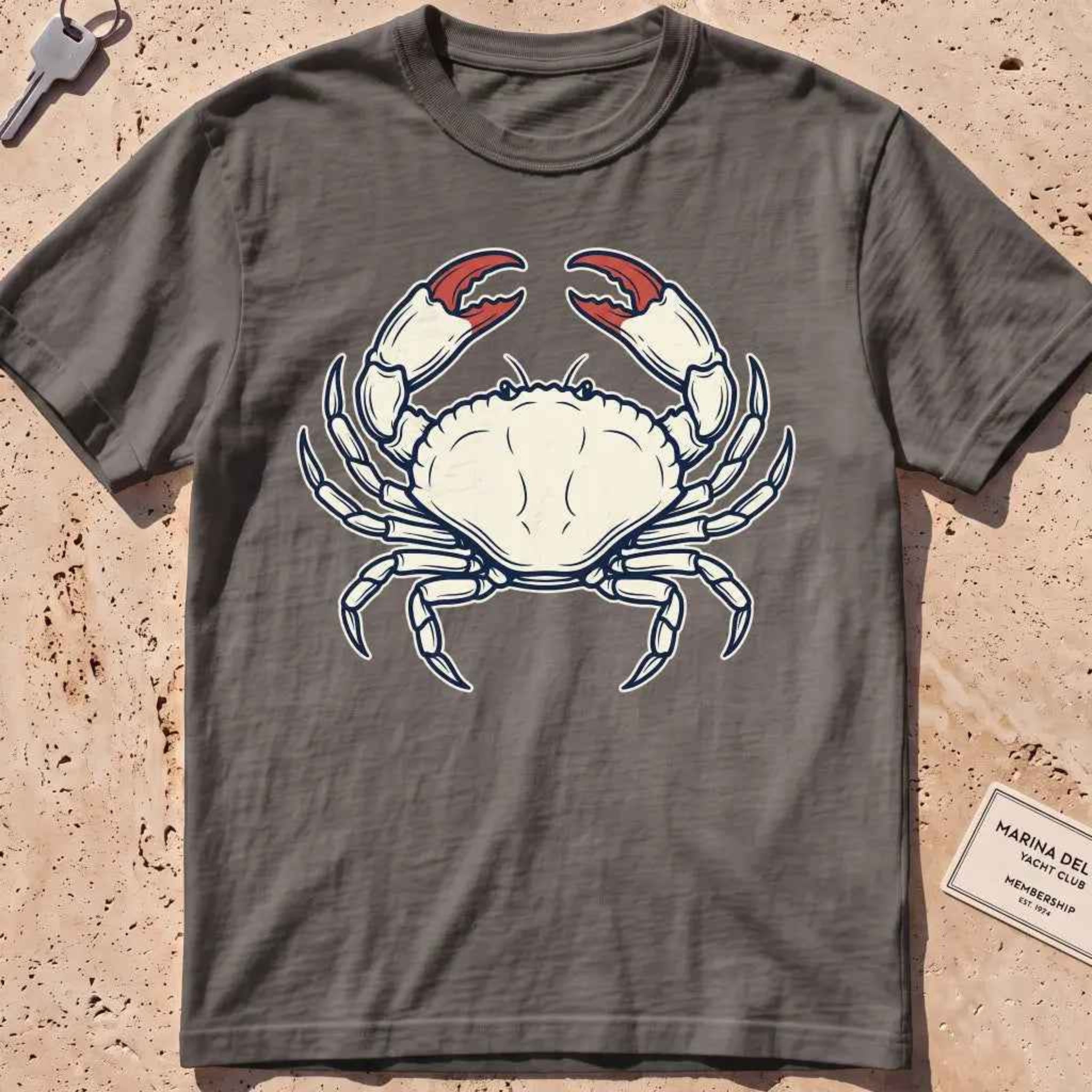 pepper heavyweight tee with a finely engraved crab in vintage coastal-wildlife line style.
