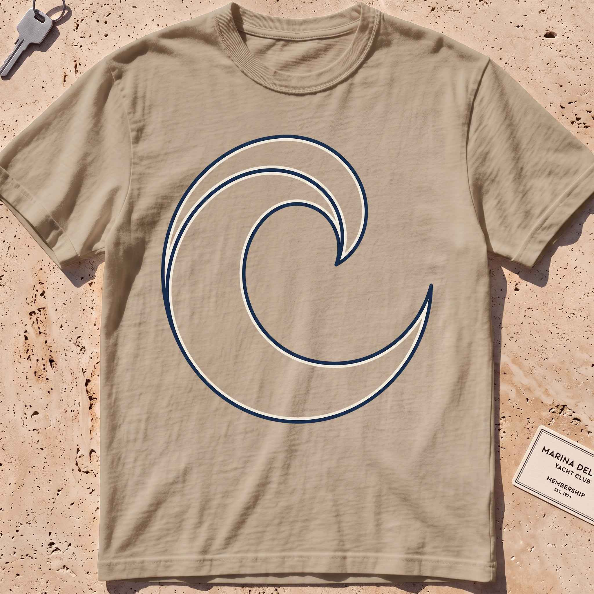 khaki heavyweight tee with a single-line breaking wave curl graphic.