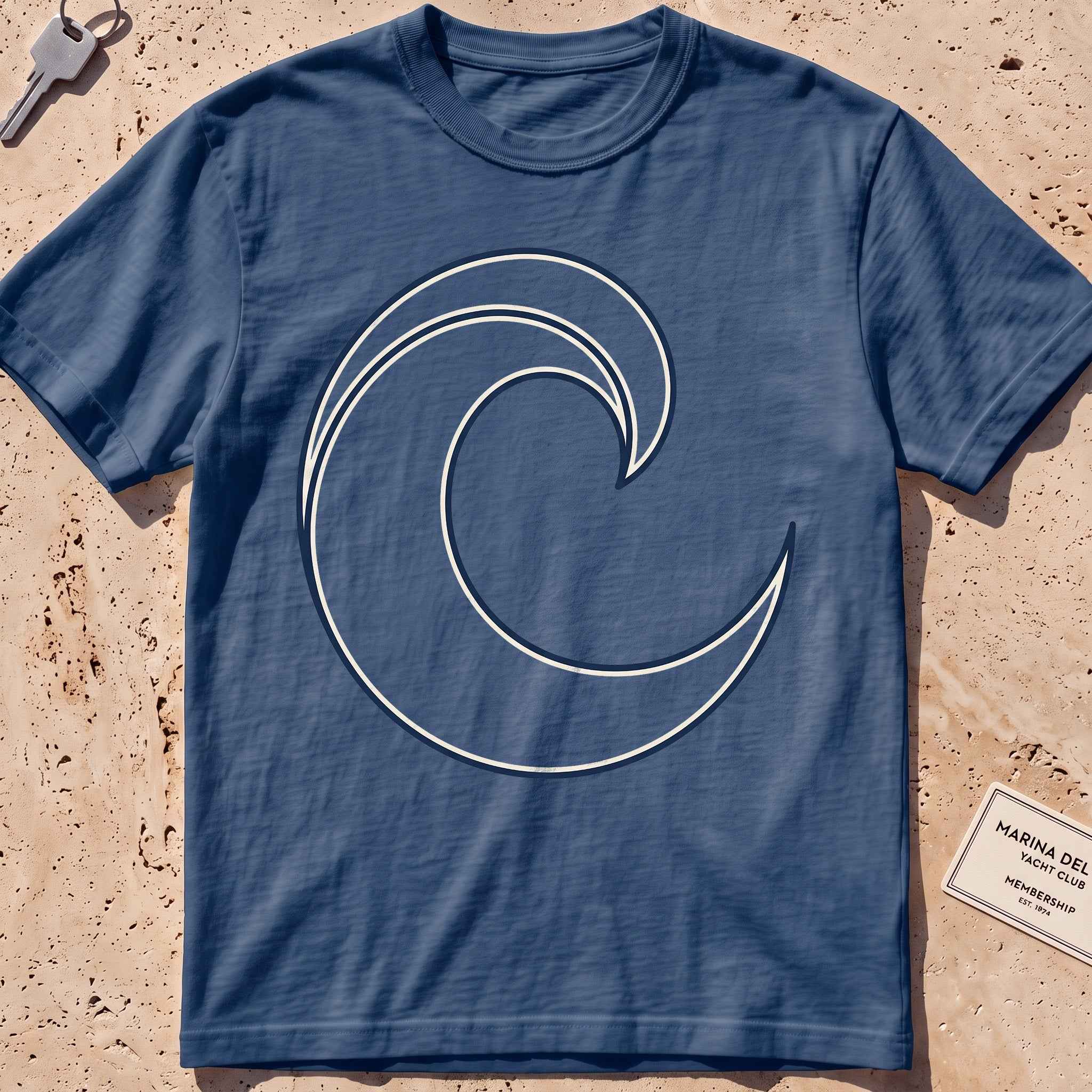 midnight heavyweight tee with a single-line breaking wave curl graphic.