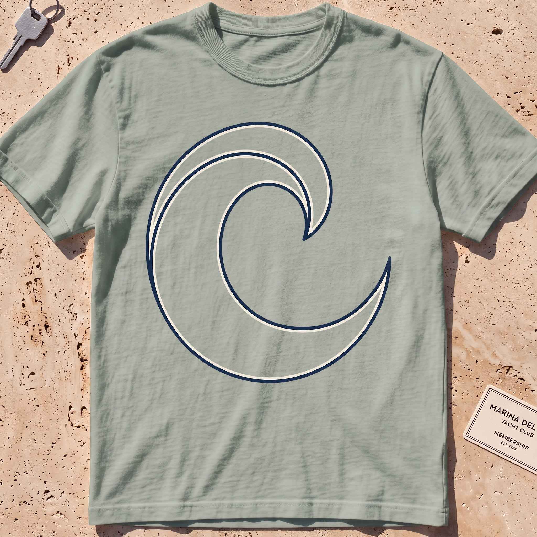 Bay heavyweight tee with a single-line breaking wave curl graphic.
