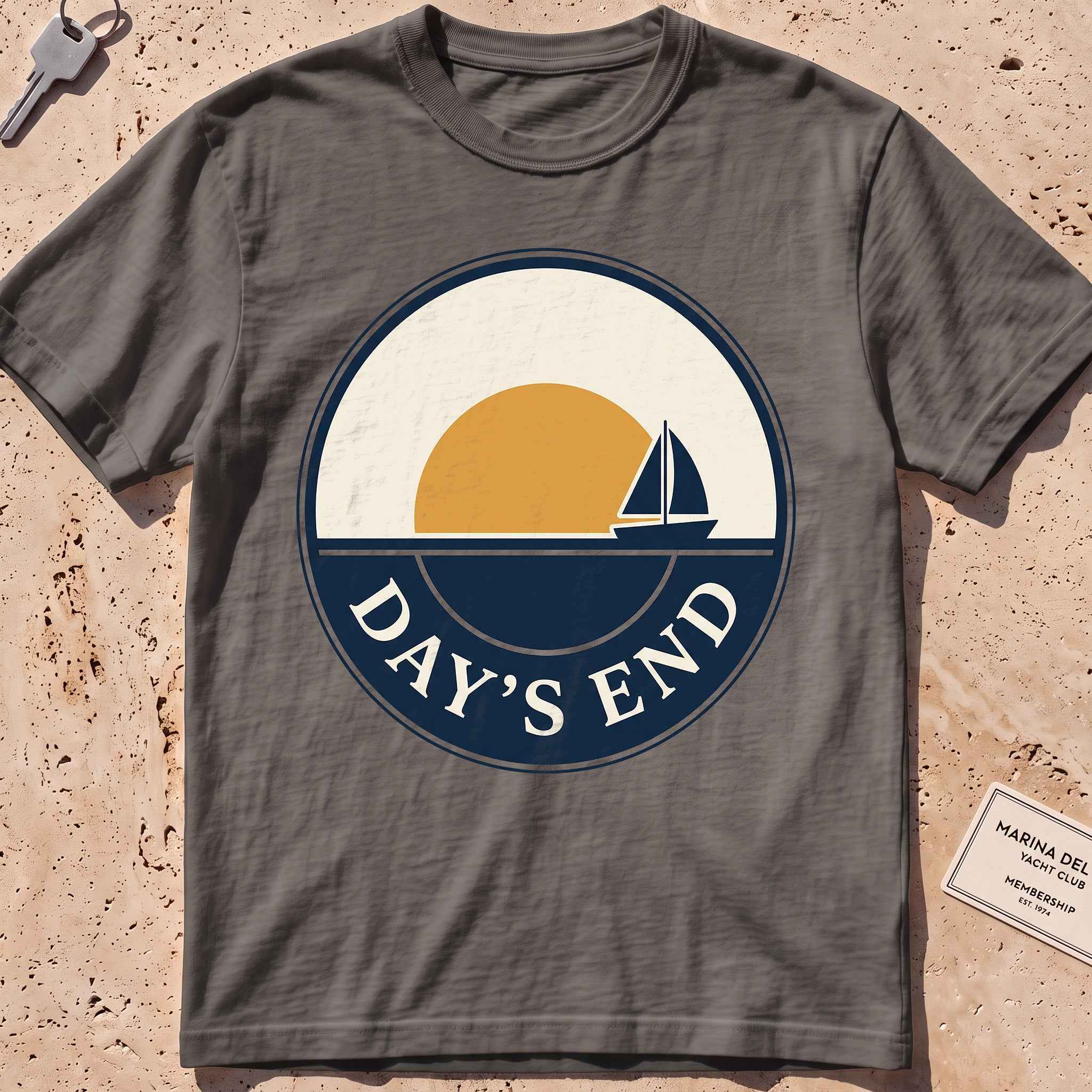pepper heavyweight tee with a bold "Day's End" sunset badge graphic.