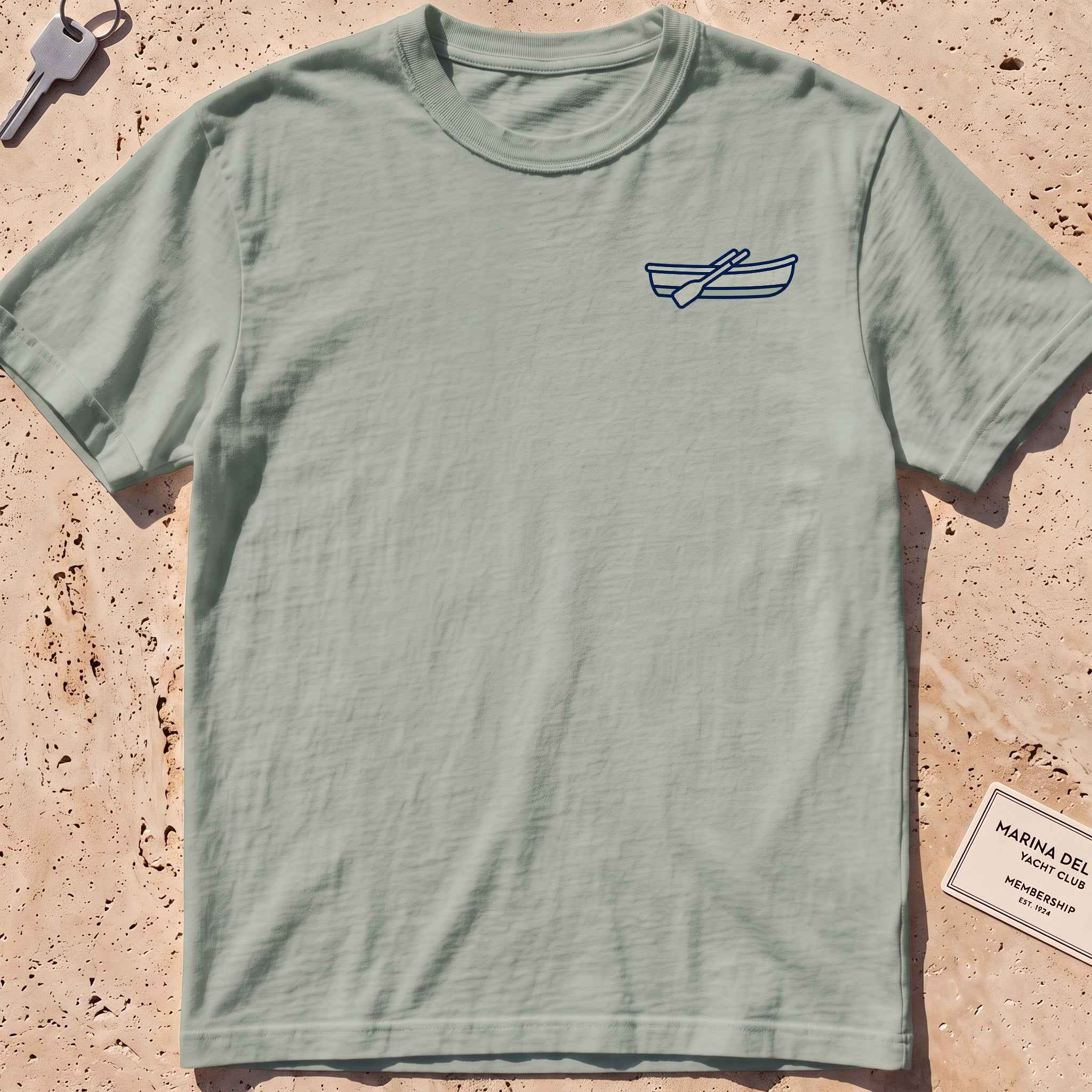 bay heavyweight tee with a rowing-dinghy crest graphic.