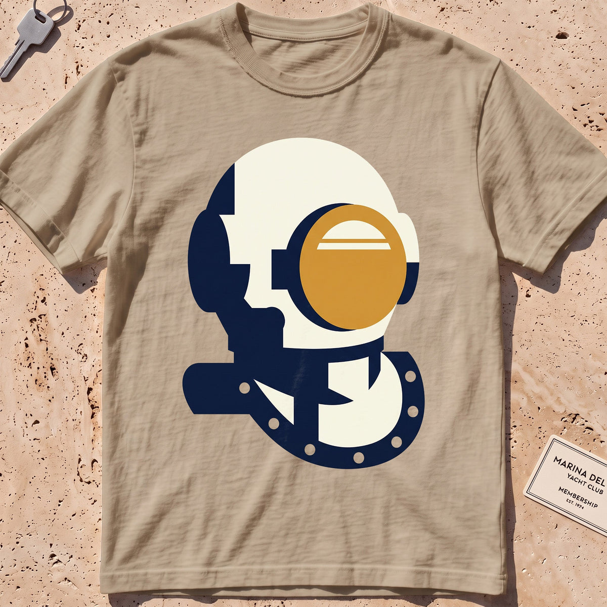 khaki heavyweight tee with a flat-geometric vintage dive helmet graphic.