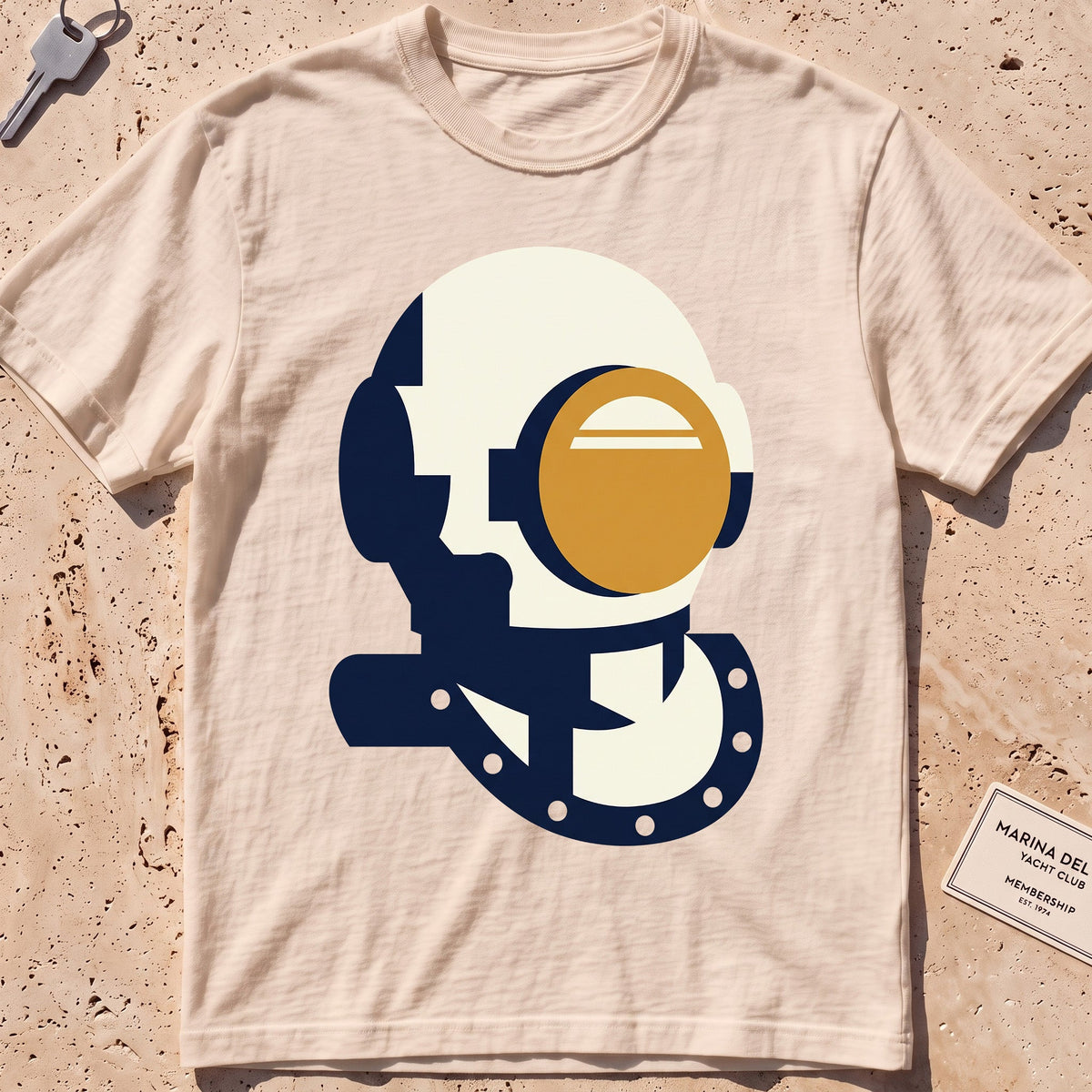 ivory heavyweight tee with a flat-geometric vintage dive helmet graphic.