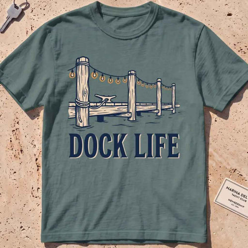 blue spruce heavyweight tee with dock pilings and string lights "Dock Life" graphic.