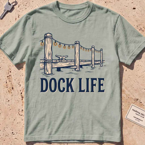 bay heavyweight tee with dock pilings and string lights "Dock Life" graphic.