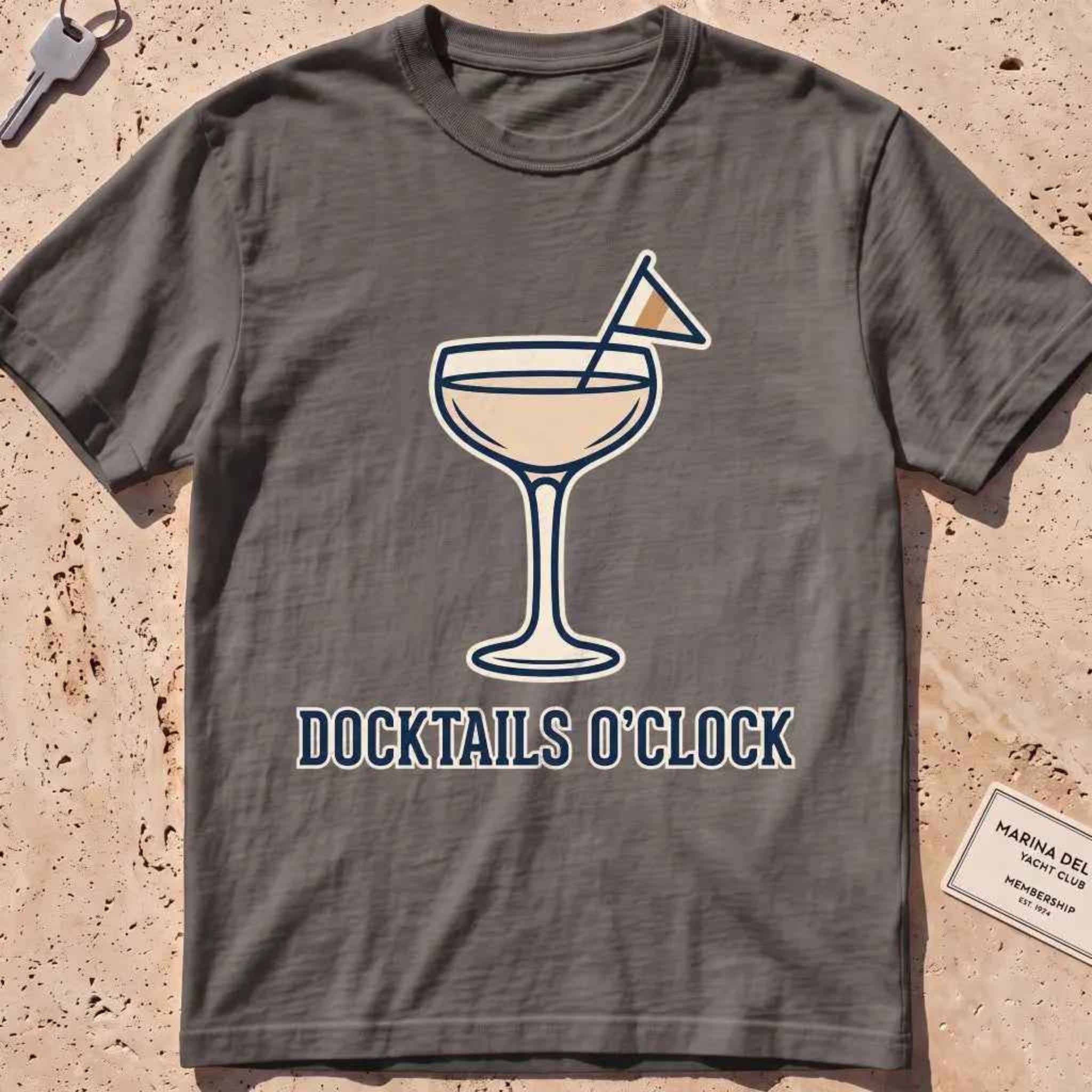 pepper heavyweight tee with a cocktail coupe, burgee and "Docktails O'Clock" text.