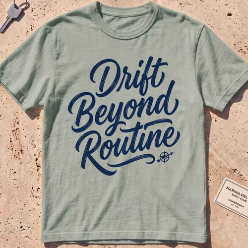 bay heavyweight tee with brush-script "Drift Beyond Routine" typography.