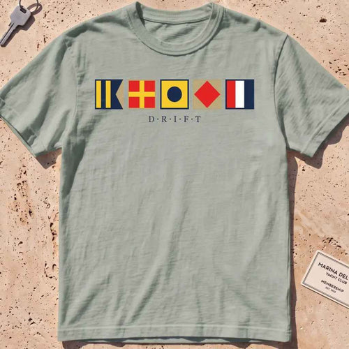 bay heavyweight tee with maritime signal flags spelling out the word "DRIFT."