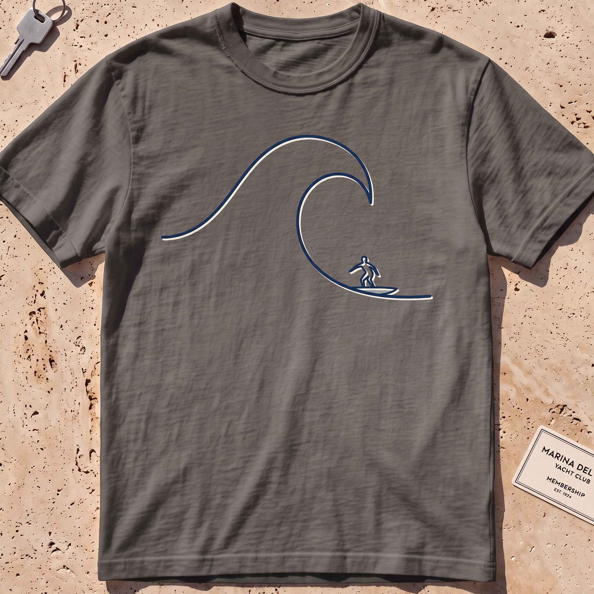 pepper heavyweight tee with a single-line surfer dropping into a wave graphic.