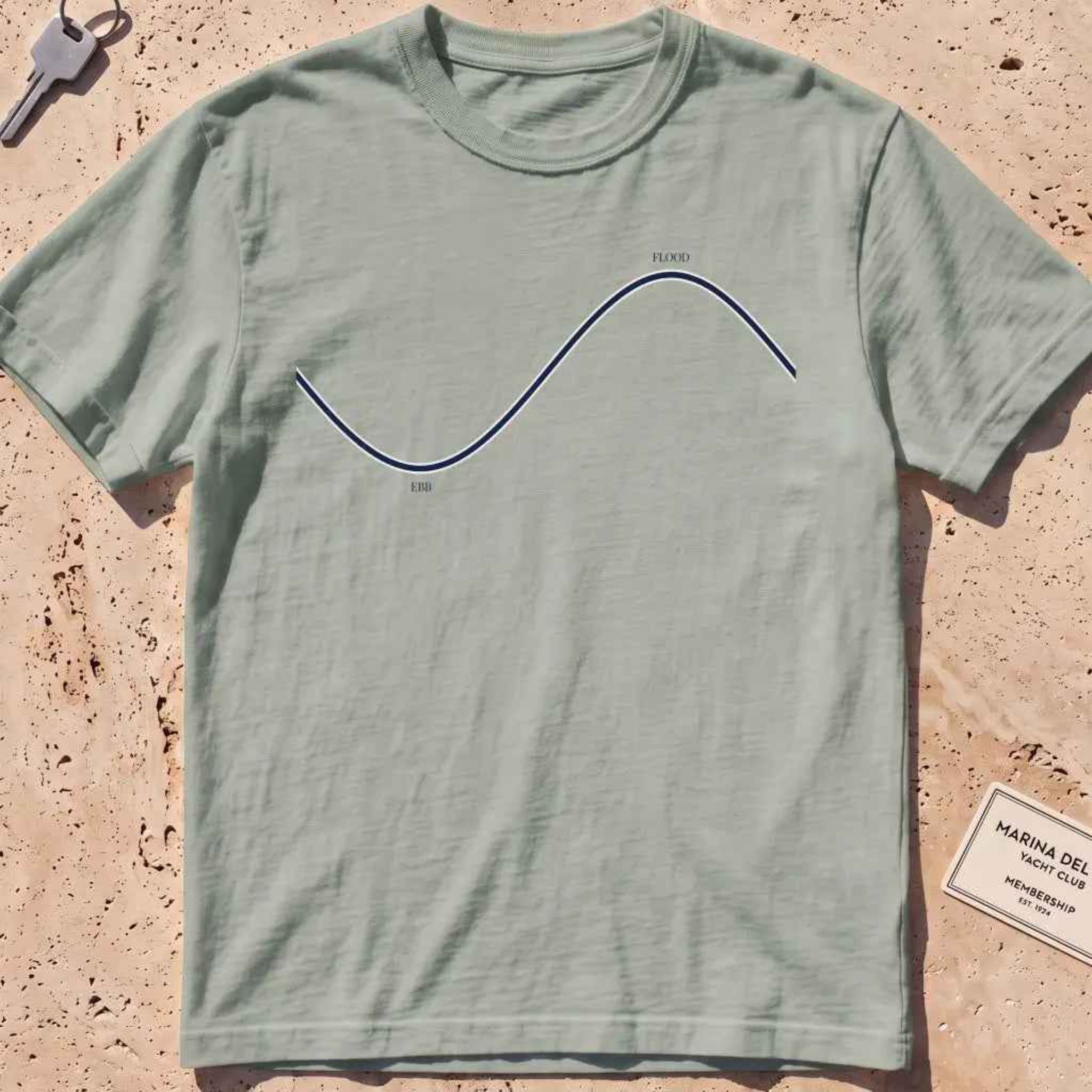 bay heavyweight tee with a minimalist "Ebb and Flood" tide curve graphic.