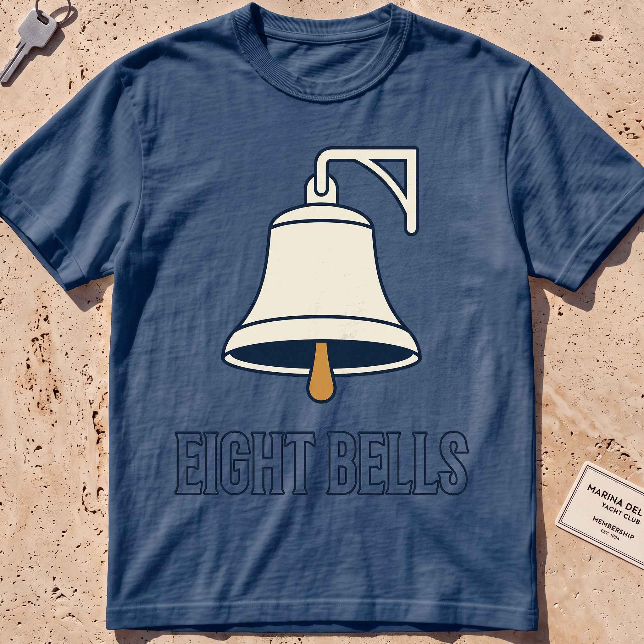 midnight heavyweight tee with a bold ship's-bell "Eight Bells" graphic.