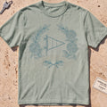 bay heavyweight tee with a burgee and hydrangea wreath "Est. by the Water" graphic.