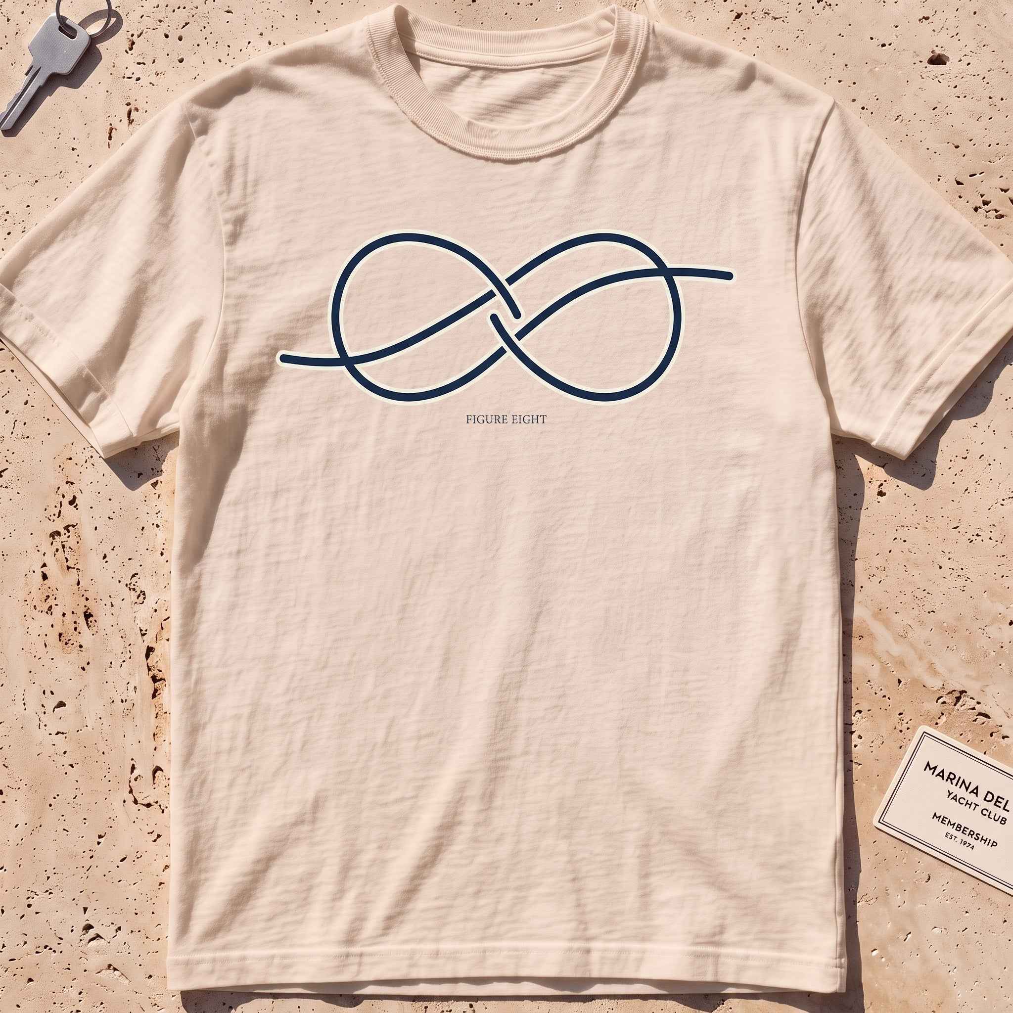 ivory heavyweight tee with a single-line figure-eight knot graphic.