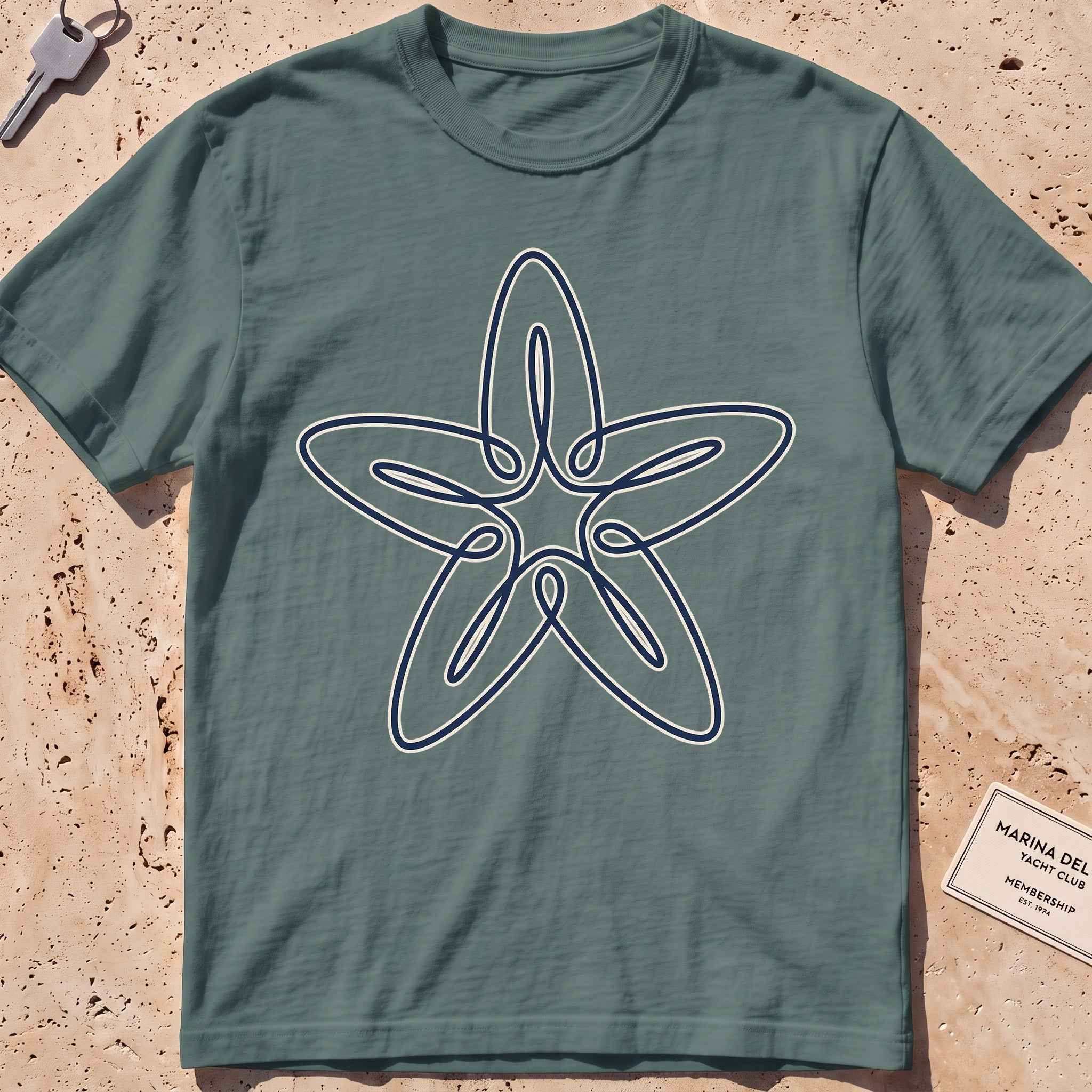 blue spruce heavyweight tee with a single-line five-armed starfish graphic.