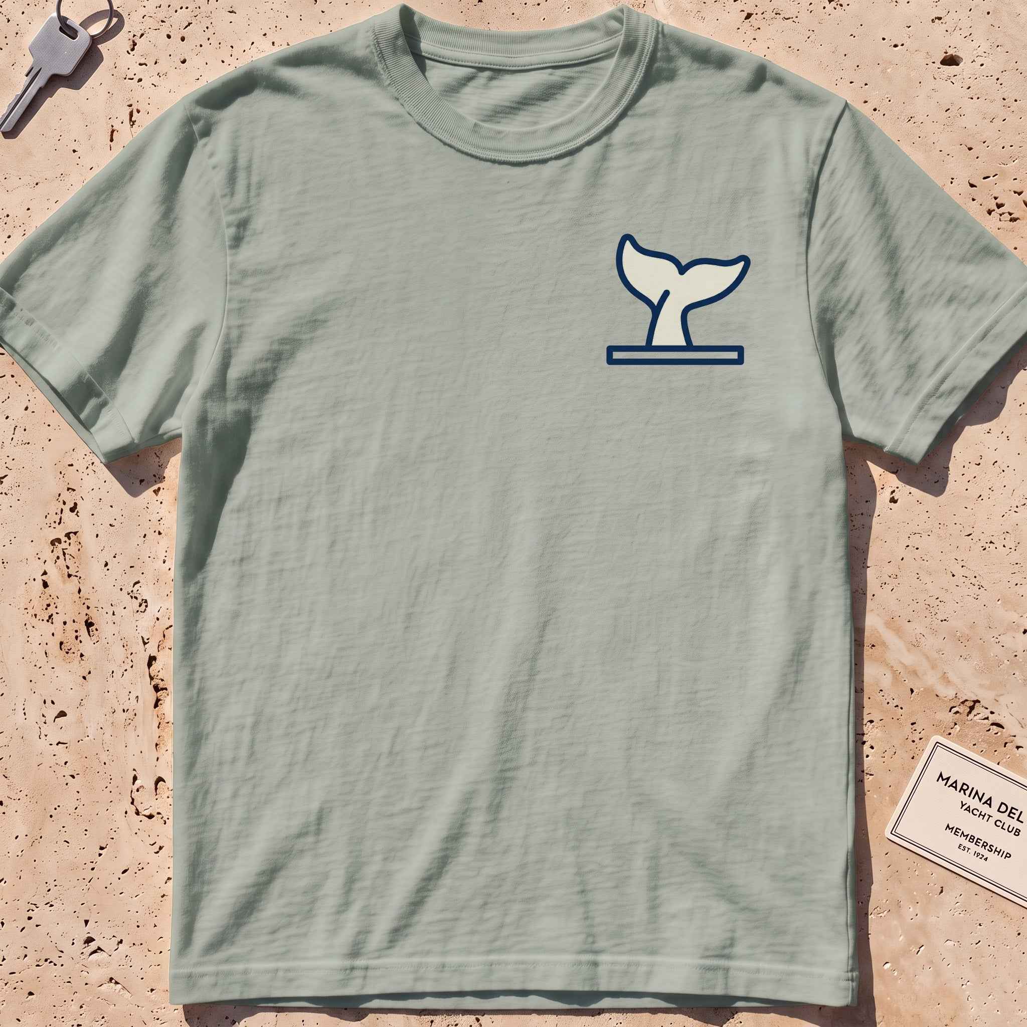 bay heavyweight tee with a diving whale-fluke crest graphic.