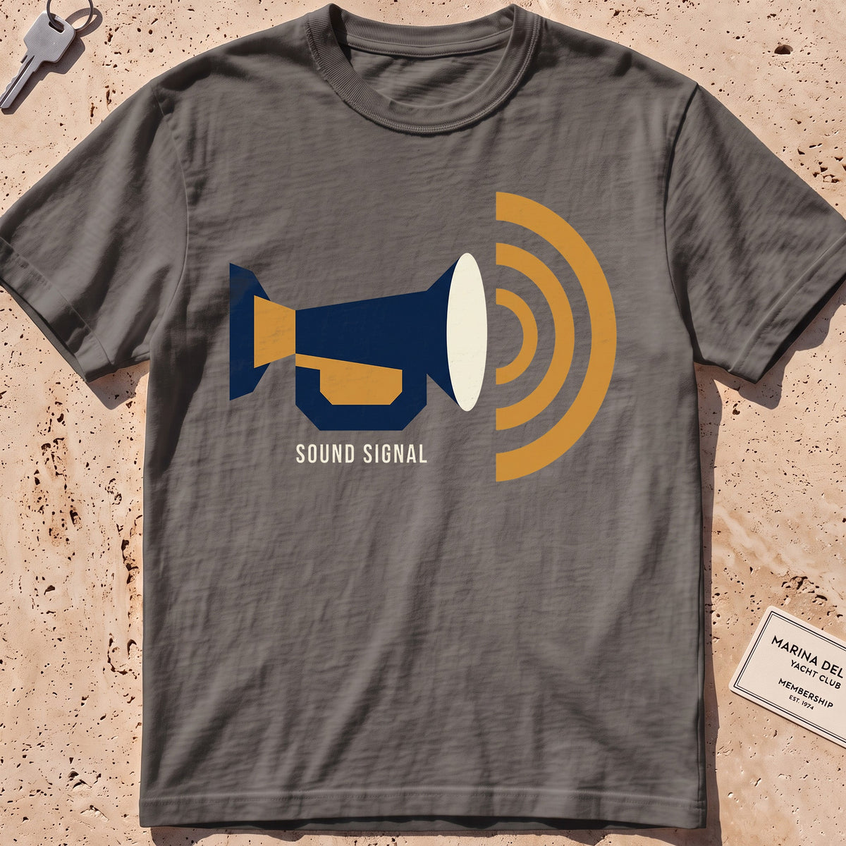 pepper heavyweight tee with a flat-geometric foghorn "Sound Signal" graphic.