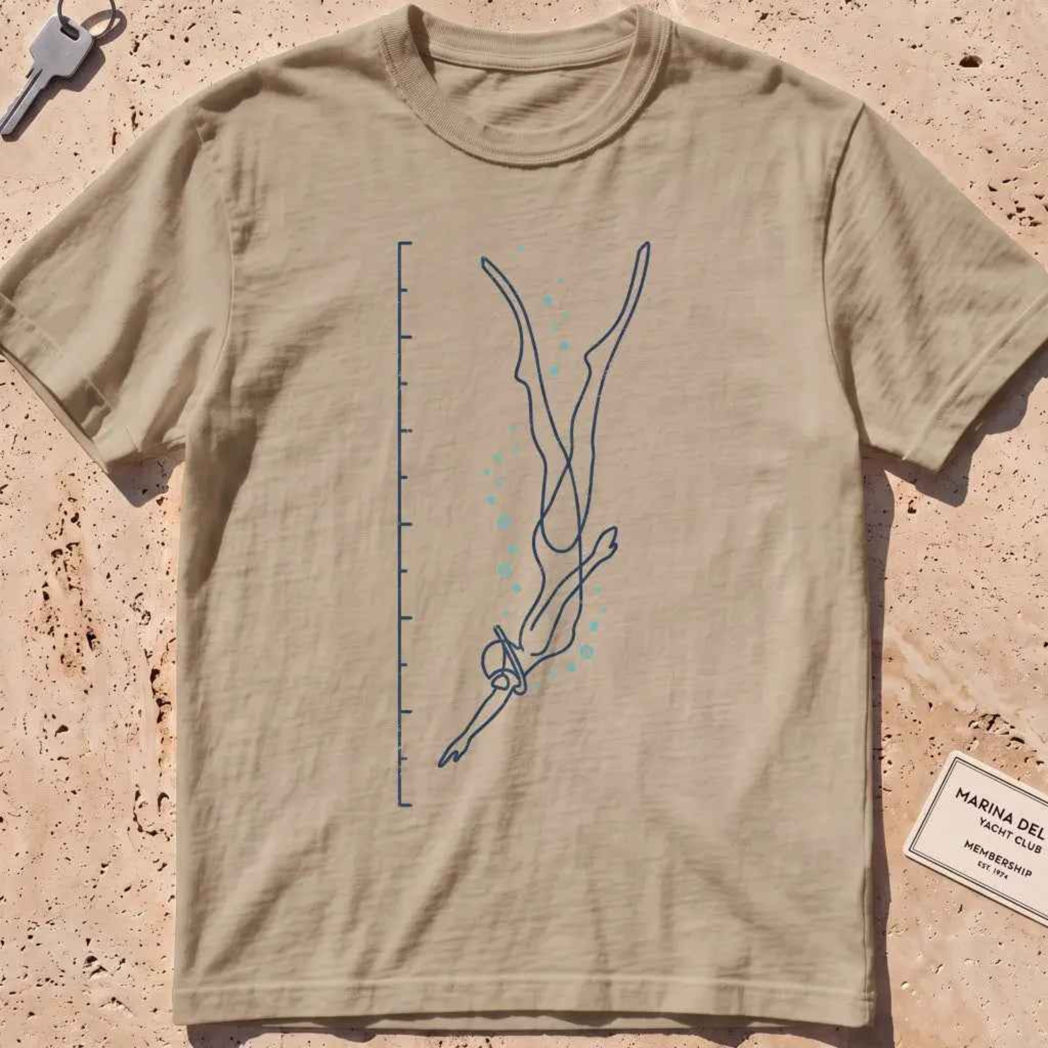 khaki heavyweight tee with a single-line freediver and depth-scale graphic.