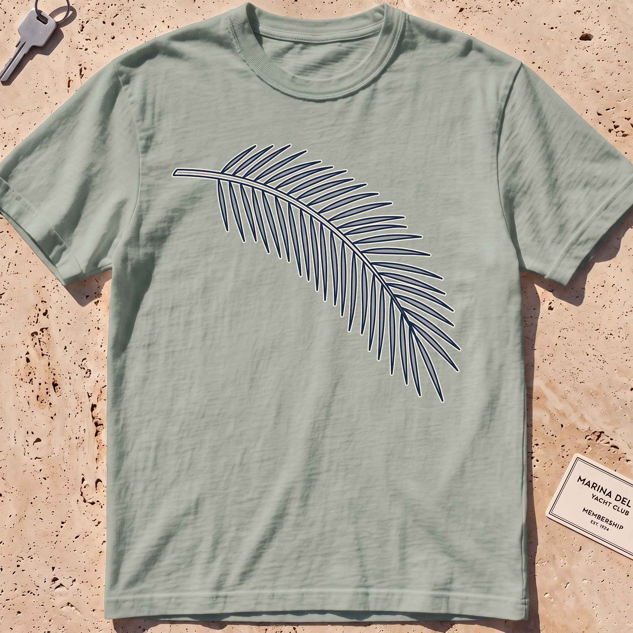 bay heavyweight tee with a single-line palm frond graphic.